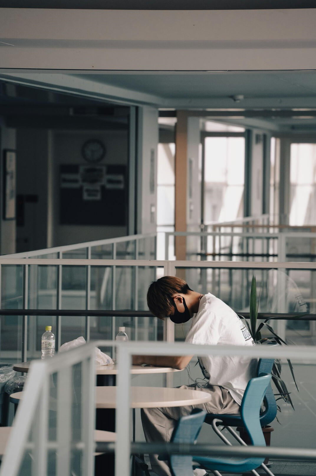 person meditating at desk