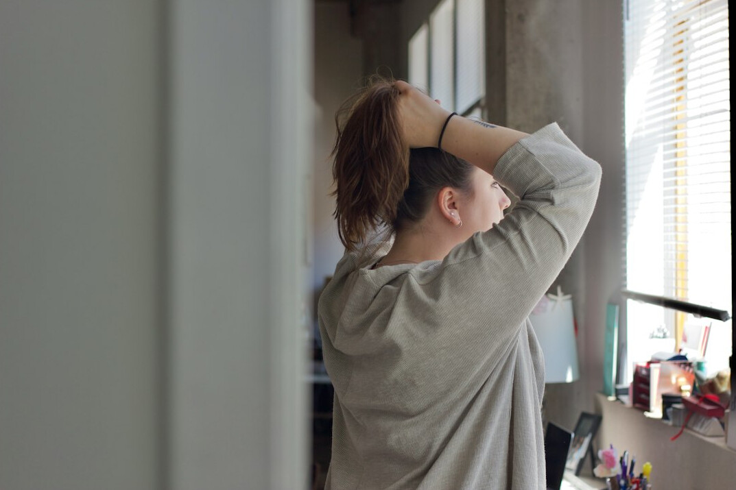 Office worker stretching at their desk