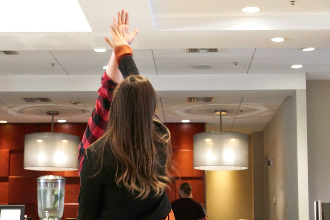 person leading office yoga