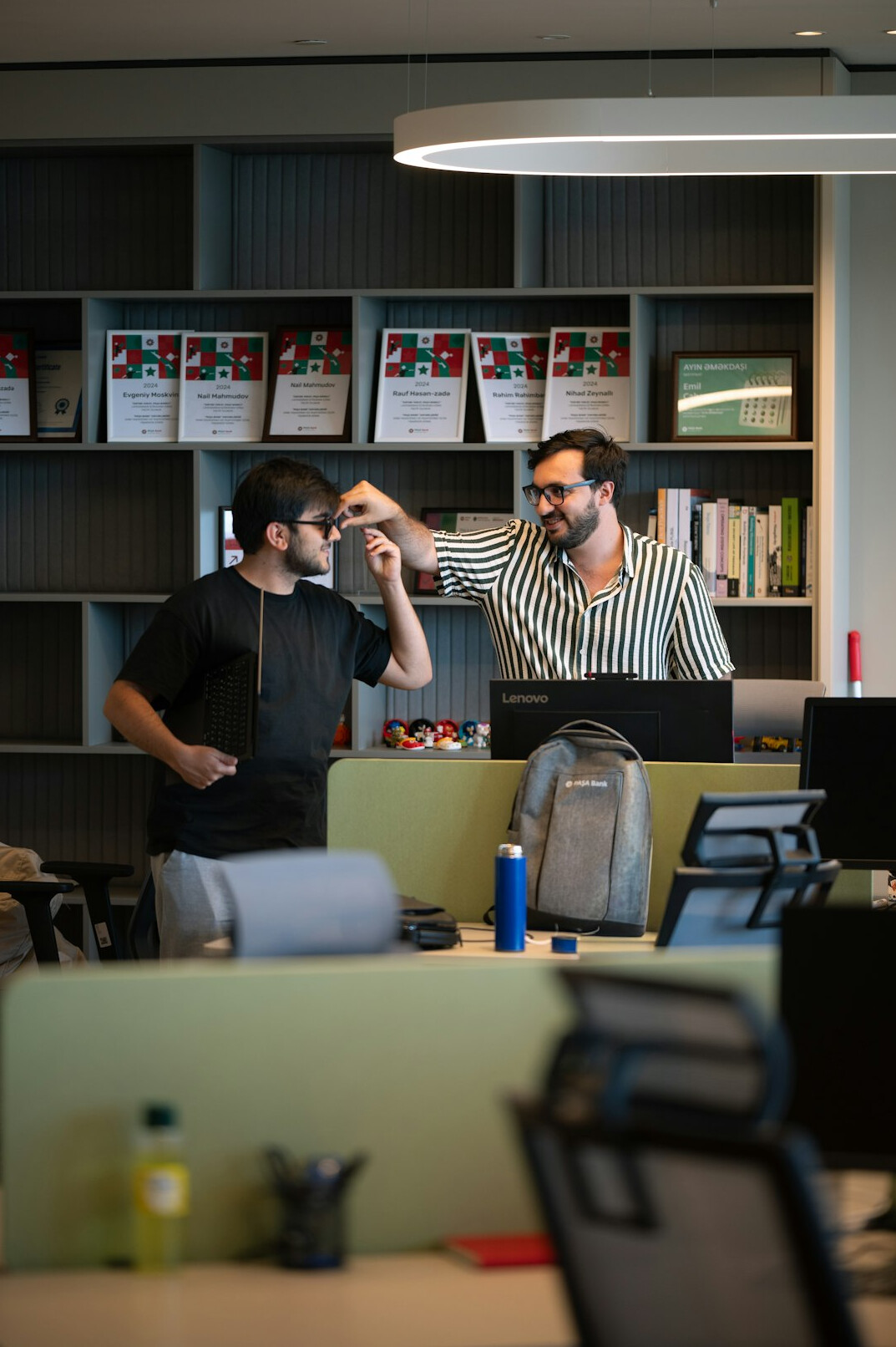 team doing group exercises in office